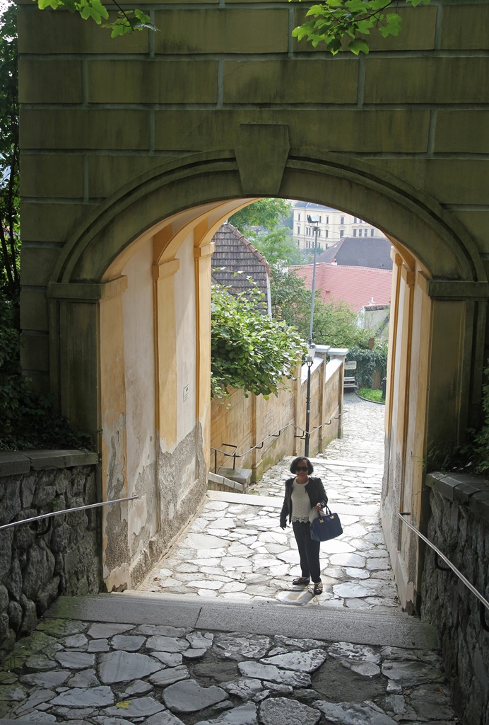 Nella and Archway on Stairs Back to Town