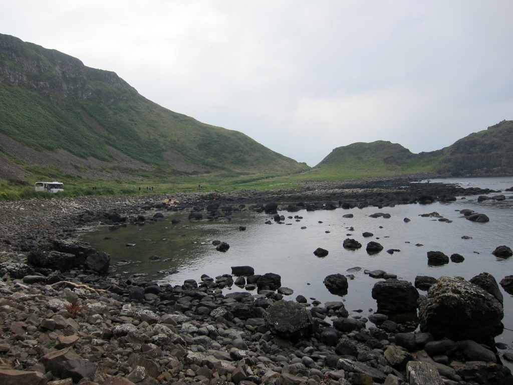 Shoreline, Bus and Hiking Tourists