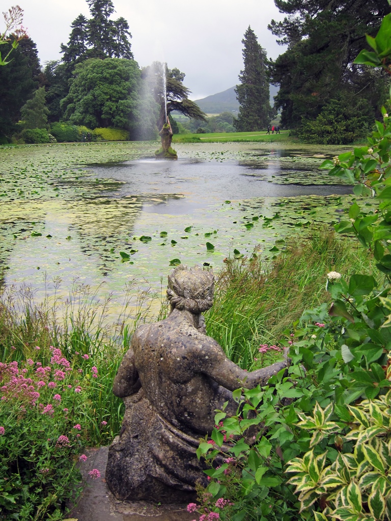 Statue Hiding in Weeds