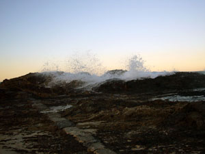 Wave Breaking on Rocks