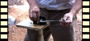 Guide Demonstrating Macadamia Nut Cracker