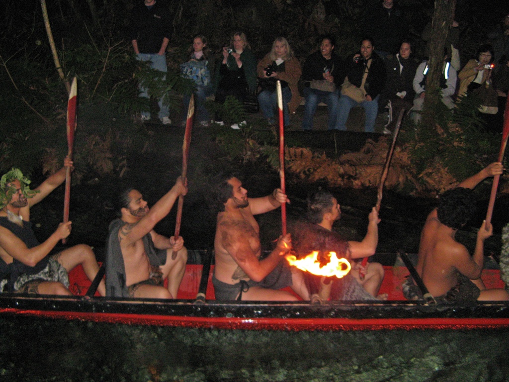 Canoers with Raised Paddles