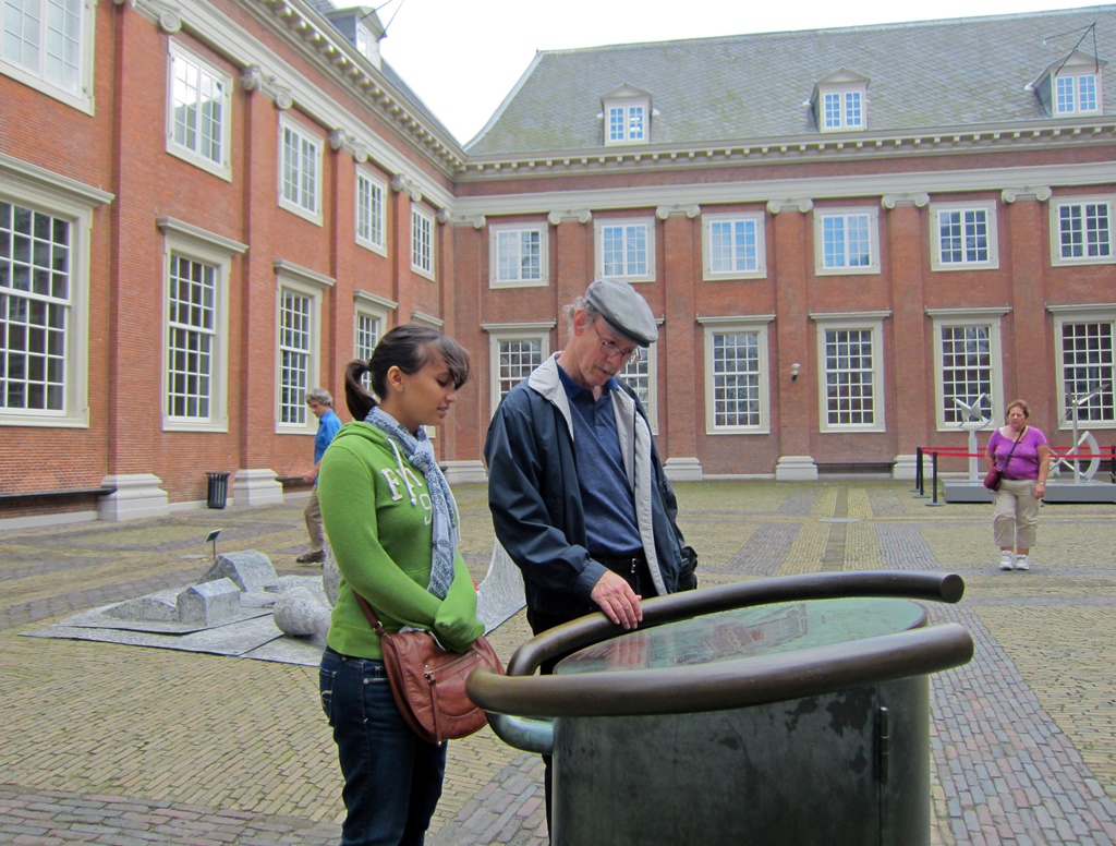 Connie and Bob and Map in Courtyard