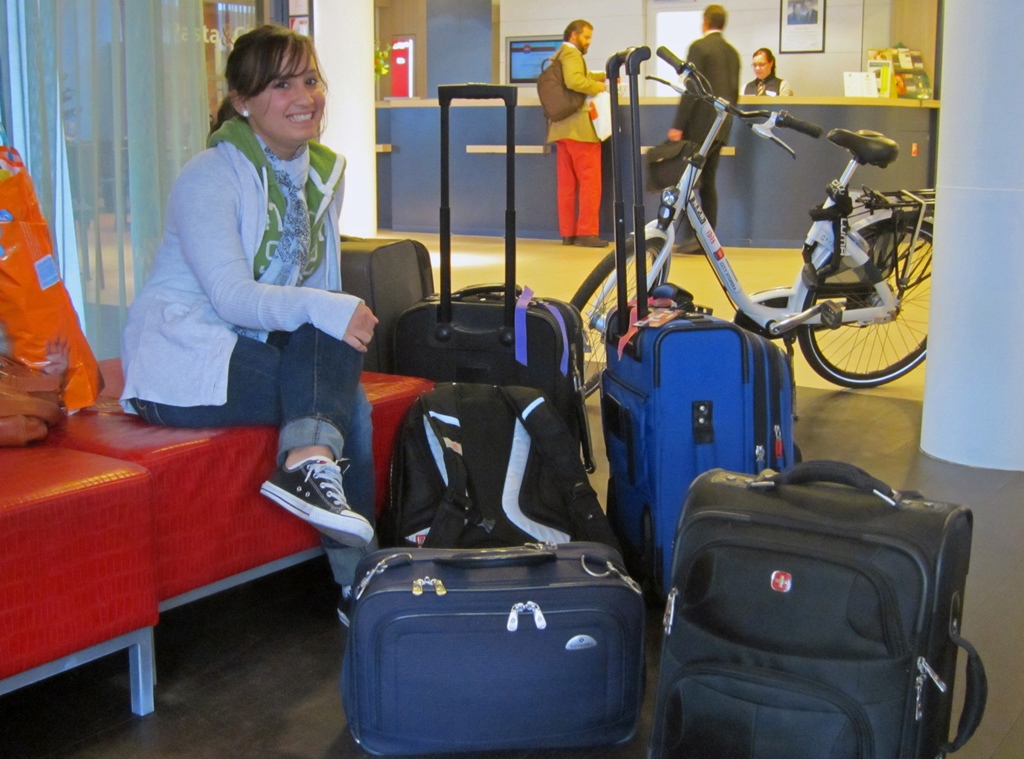 Connie and Luggage in Hotel Lobby