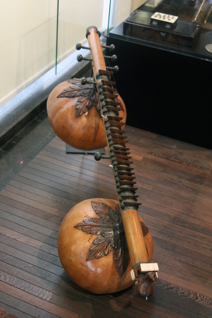 chinese stringed instrument with dragon end