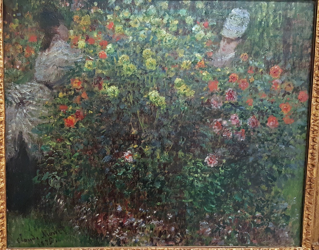 Two Women Among Flowers